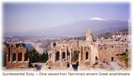 Snow-capped Mount Etna viewed from 
Taormina's ancient amphitheatre.